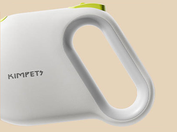 Close-up of retractable dog leash with durable ABS housing, showing impact-resistant outer shell