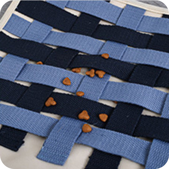 Multiple treat-hiding zones on a dog snuffle mat to encourage natural sniffing